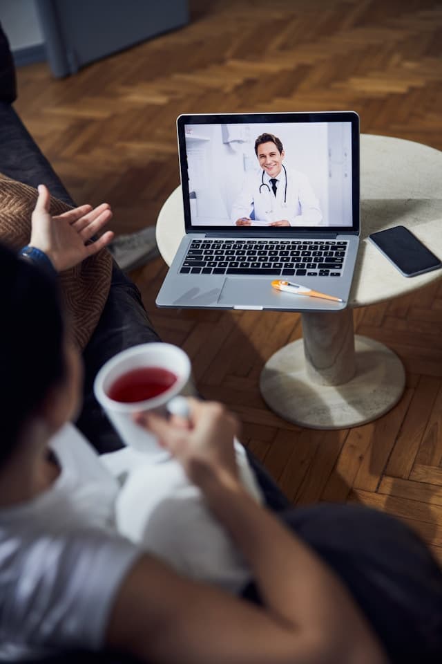 Telemedicine patient call from laptop.